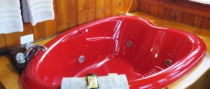 Red heart-shaped jetted tub