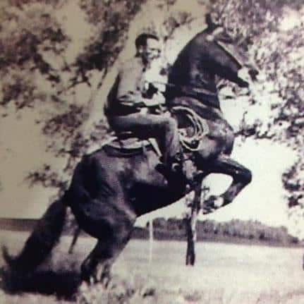 Man riding horseback